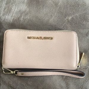 Baby pink Michael kors wristlet/wallet